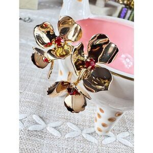 Zara Gold Floral Hoop Earrings with Red Crystal Centers